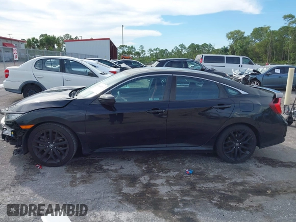 2020 Honda Civic Si with VIN 2HGFC1E50LH702493, listed as a IAAI auction lot 40609245 with 62,660 mi miles and . Bid and sale history available at DreamBid. Image 14.