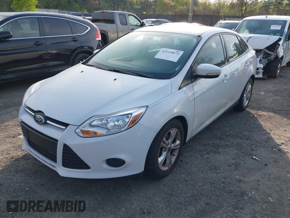 2013 Ford Focus SE z VIN 1FADP3F29DL239824, wystawiony jako IAAI lot #42219875 z przebiegiem 86 699 mil mil oraz . Historia ofert i sprzedaży dostępna na DreamBid. Obrazek 2.