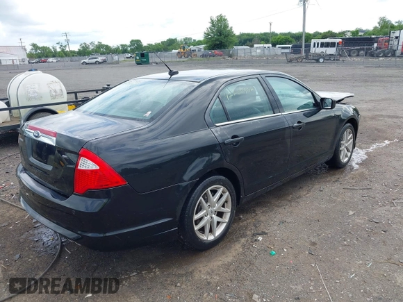 2012 Ford Fusion SEL z VIN 3FAHP0JA4CR256836, wystawiony jako IAAI lot #42266562 z przebiegiem 134 756 mil mil oraz . Historia ofert i sprzedaży dostępna na DreamBid. Obrazek 4.