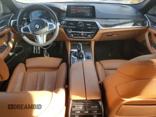2020 BMW 5 Series M550i xDrive с VIN WBAJS7C02LCE21157, выставлен на аукционе Copart как лот 87420314 с пробегом 65 919 миль миль и Списание • Salvage title. История ставок и продаж доступна на DreamBid. Изображение 8.