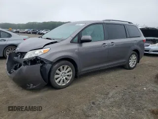 2017 Toyota Sienna XLE with VIN 5TDDZ3DC4HS187233, listed as a Copart auction lot 60227715 with 123,191 mi miles and Salvage title. Bid and sale history available at DreamBid. Image 1.
