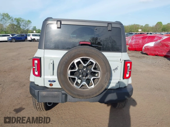 2023 Ford Bronco with VIN 1FMDE5BH3PLA90591, listed as a IAAI auction lot 42127867 with 34,616 mi miles and . Bid and sale history available at DreamBid. Image 16.