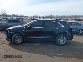 2019 Cadillac XT5 Luxury AWD with VIN 1GYKNDRS5KZ172975, listed as a IAAI auction lot 41814397 with 63,563 mi miles and . Bid and sale history available at carsss.com. Image 14.