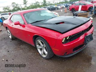2016 Dodge Challenger R/T Plus z VIN 2C3CDZBT7GH300254, wystawiony jako IAAI lot #42289267 z przebiegiem 103 491 mil mil oraz . Historia ofert i sprzedaży dostępna na DreamBid. Obrazek 1.