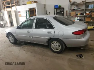 2002 Ford Escort Fleet Standard z VIN 3FAFP13P82R144456, wystawiony jako Copart lot #58832935 z przebiegiem 124 502 mil mil oraz Szkody całkowita. Historia ofert i sprzedaży dostępna na DreamBid. Obrazek 2.