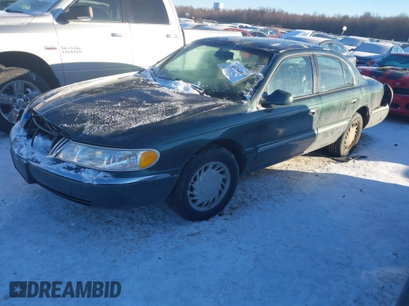 1998 Lincoln Continental with VIN 1LNFM97V4WY713283, listed as a IAAI auction lot 41264918 with 89,134 mi miles. Bid and sale history available at carsss.com. Image 17.