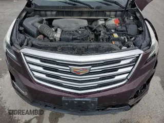 2018 Cadillac XT5 Premium Luxury FWD z VIN 1GYKNERS5JZ127703, wystawiony jako Copart lot #58315215 z przebiegiem Nie podano mil oraz Szkoda całkowita • Salvage title. Historia ofert i sprzedaży dostępna na DreamBid. Obrazek 11.