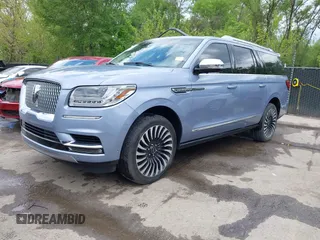 2021 Lincoln Navigator Black Label z VIN 5LMJJ3TT9MEL04485, wystawiony jako IAAI lot #42076087 z przebiegiem 69 704 mil mil oraz . Historia ofert i sprzedaży dostępna na DreamBid. Obrazek 2.