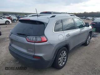 2019 Jeep Cherokee Latitude with VIN 1C4PJLCB6KD159997, listed as a IAAI auction lot 42102904 with 72,064 mi miles and . Bid and sale history available at carsss.com. Image 4.