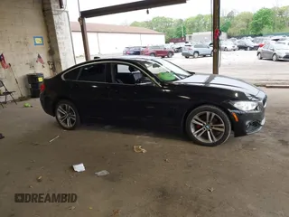 2016 BMW 4 Series 428i xDrive with VIN WBA4C9C58GG139151, listed as a IAAI auction lot 42151827 with 92,698 mi miles and . Bid and sale history available at DreamBid. Image 13.