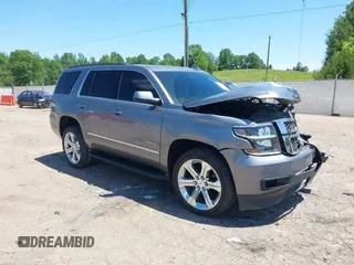 2020 Chevrolet Tahoe LT z VIN 1GNSCBKC3LR204995, wystawiony jako IAAI lot #42292566 z przebiegiem 64 874 mil mil oraz . Historia ofert i sprzedaży dostępna na DreamBid. Obrazek 1.