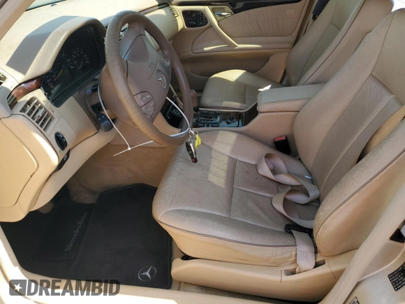 2000 Mercedes-Benz E 320 with VIN WDBJF65J4YB060708, listed as a Copart auction lot 54981615 with 71,036 mi miles and Clean Title. Bid and sale history available at DreamBid. Image 7.
