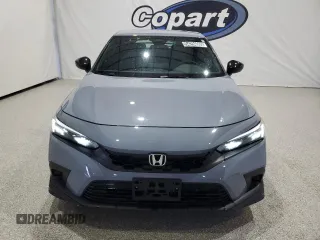 2023 Honda Civic Sport z VIN 19XFL2H89PE020319, wystawiony jako Copart lot #54294065 z przebiegiem 11 192 mil mil oraz Czysty tytuł • Clean title. Historia ofert i sprzedaży dostępna na DreamBid. Obrazek 5.