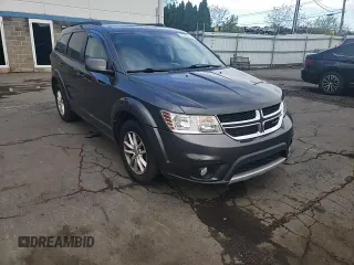 2015 Dodge Journey SXT with VIN 3C4PDDBG1FT725882, listed as a Copart auction lot 55903755 with 111,941 mi miles and Salvage title. Bid and sale history available at DreamBid. Image 14.