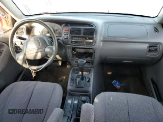 2002 Suzuki Grand Vitara JLX z VIN JS3TD62VX24151115, wystawiony jako Copart lot #71155924 z przebiegiem 264 639 mil mil oraz Szkoda całkowita • Salvage title. Historia ofert i sprzedaży dostępna na DreamBid. Obrazek 8.