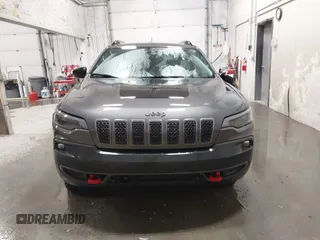 2022 Jeep Cherokee Trailhawk z VIN 1C4PJMBX9ND514703, wystawiony jako IAAI lot #41761037 z przebiegiem 38 499 mil mil oraz . Historia ofert i sprzedaży dostępna na DreamBid. Obrazek 12.