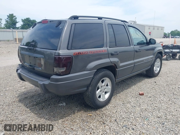2004 Jeep Grand Cherokee Laredo with VIN 1J4GW48S44C352538, listed as a IAAI auction lot 42765905 with 249,220 mi miles and . Bid and sale history available at DreamBid. Image 4.