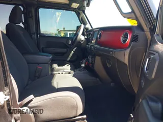 2023 Jeep Gladiator Rubicon z VIN 1C6JJTBG3PL531982, wystawiony jako IAAI lot #42211139 z przebiegiem 28 301 mil mil oraz . Historia ofert i sprzedaży dostępna na DreamBid. Obrazek 5.