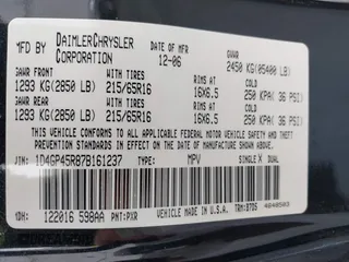 2007 Dodge Caravan SXT with VIN 1D4GP45R87B161237, listed as a IAAI auction lot 41594127 with 154,508 mi miles and . Bid and sale history available at DreamBid. Image 9.