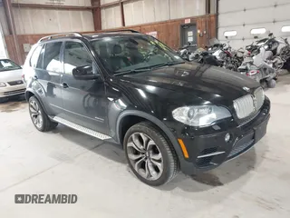 2012 BMW X5 50i with VIN 5UXZV8C50CL425721, listed as a IAAI auction lot 42590676 with 192,355 mi miles and . Bid and sale history available at DreamBid. Image 1.