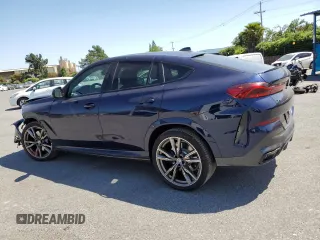 2023 BMW X6 M50i with VIN 5UXCY8C09P9P28422, listed as a Copart auction lot 52818133 with 4,131 mi miles and Salvage Title. Bid and sale history available at carsss.com. Image 2.