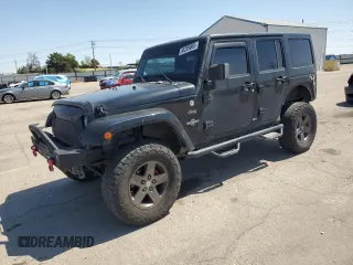 2015 Jeep Wrangler Unlimited Freedom with VIN 1C4BJWDG0FL603585, listed as a Copart auction lot 55289065 with 179,727 mi miles and Salvage title. Bid and sale history available at DreamBid. Image 1.