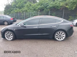 2018 Tesla Model 3 Long Range Battery z VIN 5YJ3E1EB1JF170479, wystawiony jako IAAI lot #42290687 z przebiegiem 69 495 mil mil oraz . Historia ofert i sprzedaży dostępna na DreamBid. Obrazek 15.