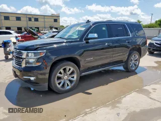 2015 Chevrolet Tahoe LTZ z VIN 1GNSCCKCXFR551217, wystawiony jako Copart lot #58213045 z przebiegiem 130 596 mil mil oraz Szkoda całkowita • Salvage title. Historia ofert i sprzedaży dostępna na DreamBid. Obrazek 1.