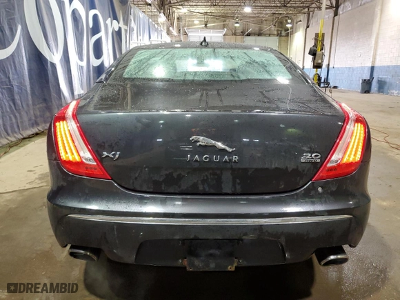2013 Jaguar XJ with VIN SAJWJ1CD0D8V51078, listed as a Copart auction lot 46449265 with NaN miles and Salvage Title. Bid and sale history available at carsss.com. Image 6.