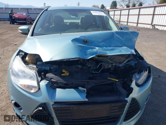 2012 Ford Focus SEL with VIN 1FAHP3H23CL417403, listed as a IAAI auction lot 42043152 with 140,604 mi miles. Bid and sale history available at carsss.com. Image 6.