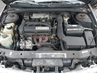 1999 Saturn SL with VIN 1G8ZK5272XZ263163, listed as a IAAI auction lot 42180002 with 138,463 mi miles. Bid and sale history available at carsss.com. Image 10.