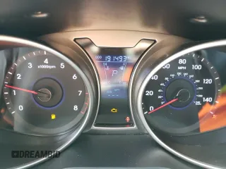 2012 Hyundai Veloster w/Red Int with VIN KMHTC6ADXCU063897, listed as a Copart auction lot 82100474 with 191,493 mi miles and Salvage title. Bid and sale history available at DreamBid. Image 9.