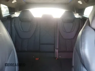 2023 BMW XM z VIN 5YM23CS04P9S41474, wystawiony jako Copart lot #64112444 z przebiegiem 13 109 mil mil oraz Szkody całkowita. Historia ofert i sprzedaży dostępna na DreamBid. Obrazek 10.
