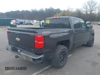 2015 Chevrolet Silverado 1500 LT with VIN 3GCUKREC9FG519510, listed as a IAAI auction lot 42026865 with 119,510 mi miles and . Bid and sale history available at DreamBid. Image 4.