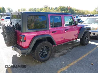2024 Jeep Wrangler Sport S with VIN 1C4RJXN6XRW323881, listed as a IAAI auction lot 40543759 with 4,440 mi miles and . Bid and sale history available at DreamBid. Image 4.