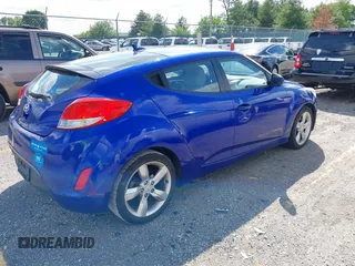 2012 Hyundai Veloster w/Gray Int z VIN KMHTC6AD3CU074501, wystawiony jako IAAI lot #42289456 z przebiegiem 94 303 mil mil oraz . Historia ofert i sprzedaży dostępna na DreamBid. Obrazek 4.