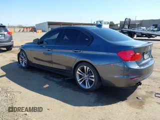2012 BMW 3 Series 328i with VIN WBA3A5C59CF345198, listed as a IAAI auction lot 41753828 with 135,726 mi miles. Bid and sale history available at carsss.com. Image 3.