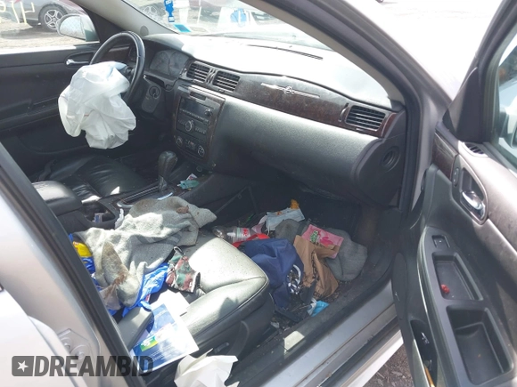 2014 Chevrolet Impala LTZ with VIN 2G1WC5E30E1120094, listed as a IAAI auction lot 41909136 with 117,922 mi miles and . Bid and sale history available at DreamBid. Image 5.