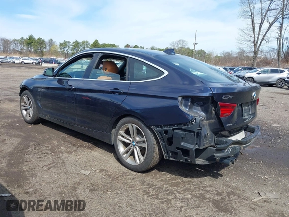 2018 BMW 3 Series 330i xDrive with VIN WBA8Z9C54JG828207, listed as a IAAI auction lot 42000931 with 73,736 mi miles. Bid and sale history available at carsss.com. Image 3.