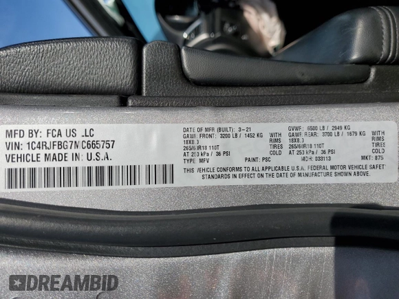 2021 Jeep Grand Cherokee 80th Anniversary with VIN 1C4RJFBG7MC665757, listed as a Copart auction lot 52443235 with 99,828 mi miles and Salvage Title. Bid and sale history available at DreamBid. Image 16.