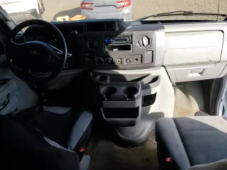 2011 Ford Econoline Passenger XL with VIN 1FBNE3BL0BDB17271, listed as a Copart auction lot 43022735 with 184,054 mi miles and Salvage Title. Bid and sale history available at carsss.com. Image 8.
