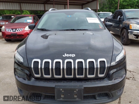 2014 Jeep Cherokee Latitude with VIN 1C4PJMCS5EW294743, listed as a IAAI auction lot 42098992 with 185,814 mi miles. Bid and sale history available at carsss.com. Image 6.