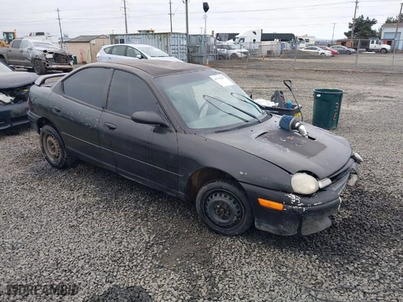 1999 Dodge Neon Competition with VIN 1B3ES47C9XD111397, listed as a IAAI auction lot 41702657 with 210,033 mi miles. Bid and sale history available at carsss.com. Image 1.