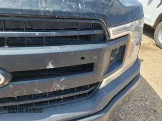 2018 Ford F-150 XL with VIN 1FTFX1E51JKD87048, listed as a IAAI auction lot 42511188 with 147,327 mi miles and . Bid and sale history available at DreamBid. Image 1.