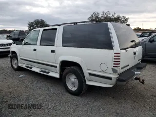 1995 GMC Suburban z VIN 1GKFK16K3SJ704911, wystawiony jako Copart lot #88326825 z przebiegiem 191 006 mil mil oraz Szkoda całkowita • Salvage title. Historia ofert i sprzedaży dostępna na DreamBid. Obrazek 2.