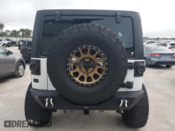 2018 Jeep Wrangler JK Unlimited Sport S with VIN 1C4BJWDG4JL814586, listed as a Copart auction lot 78290194 with 73,125 mi miles and Salvage Title. Bid and sale history available at carsss.com. Image 6.