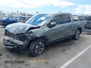 2017 Honda Ridgeline RTL-T with VIN 5FPYK2F63HB001488, listed as a IAAI auction lot 40078694 with Not provided miles and . Bid and sale history available at DreamBid. Image 2.