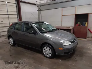 2007 Ford Focus S with VIN 1FAFP37N87W333049, listed as a IAAI auction lot 41450683 with 307,869 mi miles and . Bid and sale history available at carsss.com. Image 1.