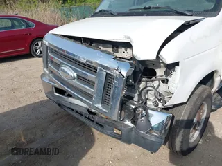 2009 Ford Econoline Cargo with VIN 1FTNE24W89DA31505, listed as a IAAI auction lot 42066233 with 267,327 mi miles. Bid and sale history available at carsss.com. Image 6.