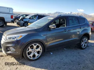 2019 Ford Escape Titanium with VIN 1FMCU9J90KUA00316, listed as a Copart auction lot 45917075 with 84,331 mi miles and Salvage Title. Bid and sale history available at carsss.com. Image 1.